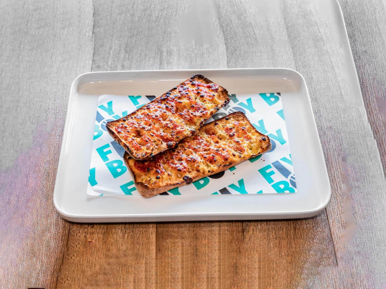 Sriracha infused garlic ciabatta